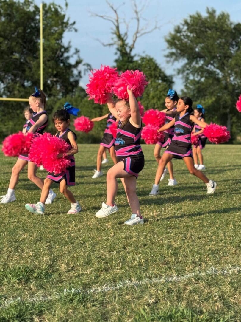 Be Someone Sports cheer squad celebrating