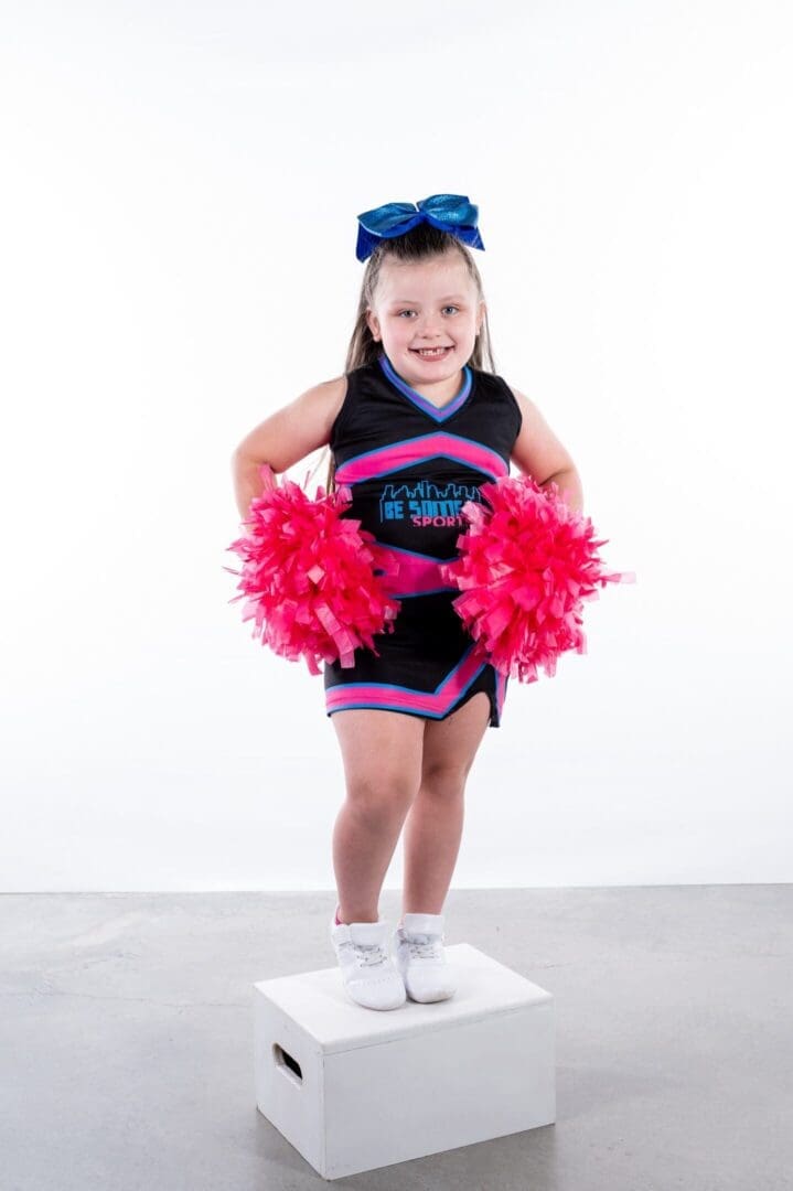 Be Someone Sports cheerleaders on the sideline
