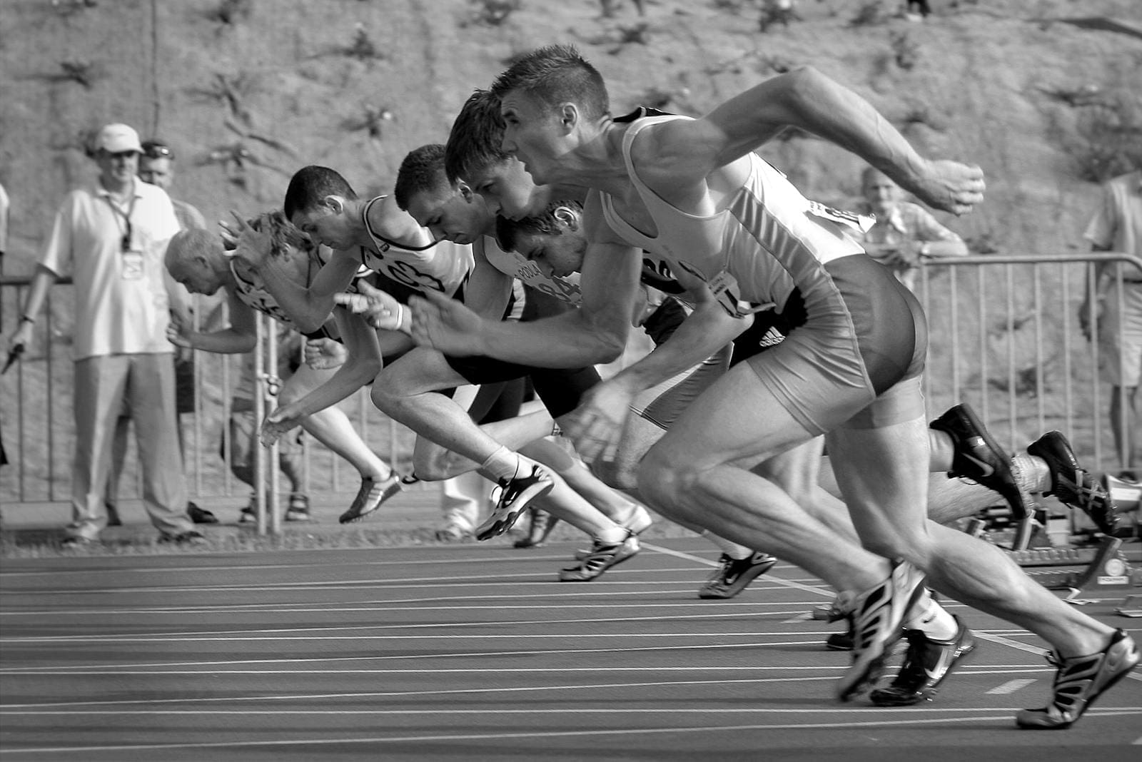 Sprinter in starting blocks ready to explode forward